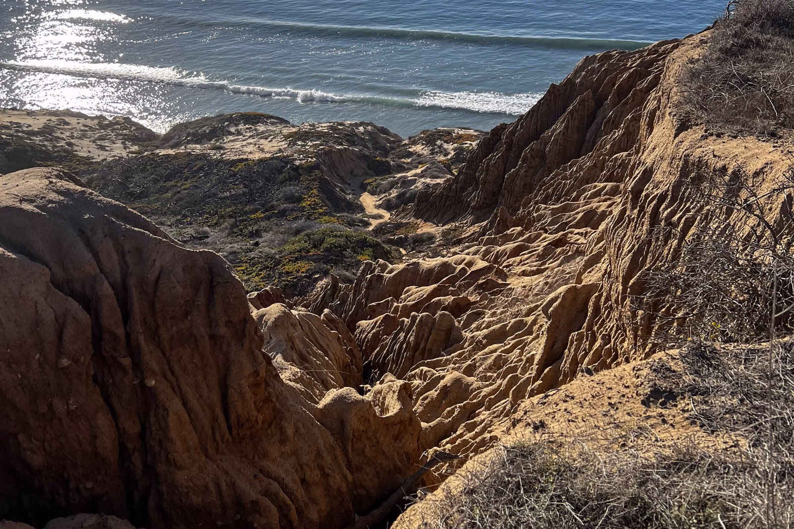 Weathered sandstone formations above the ocean